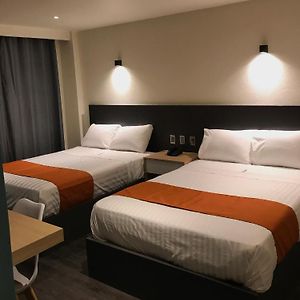 Habitación Cuádruple Deluxe